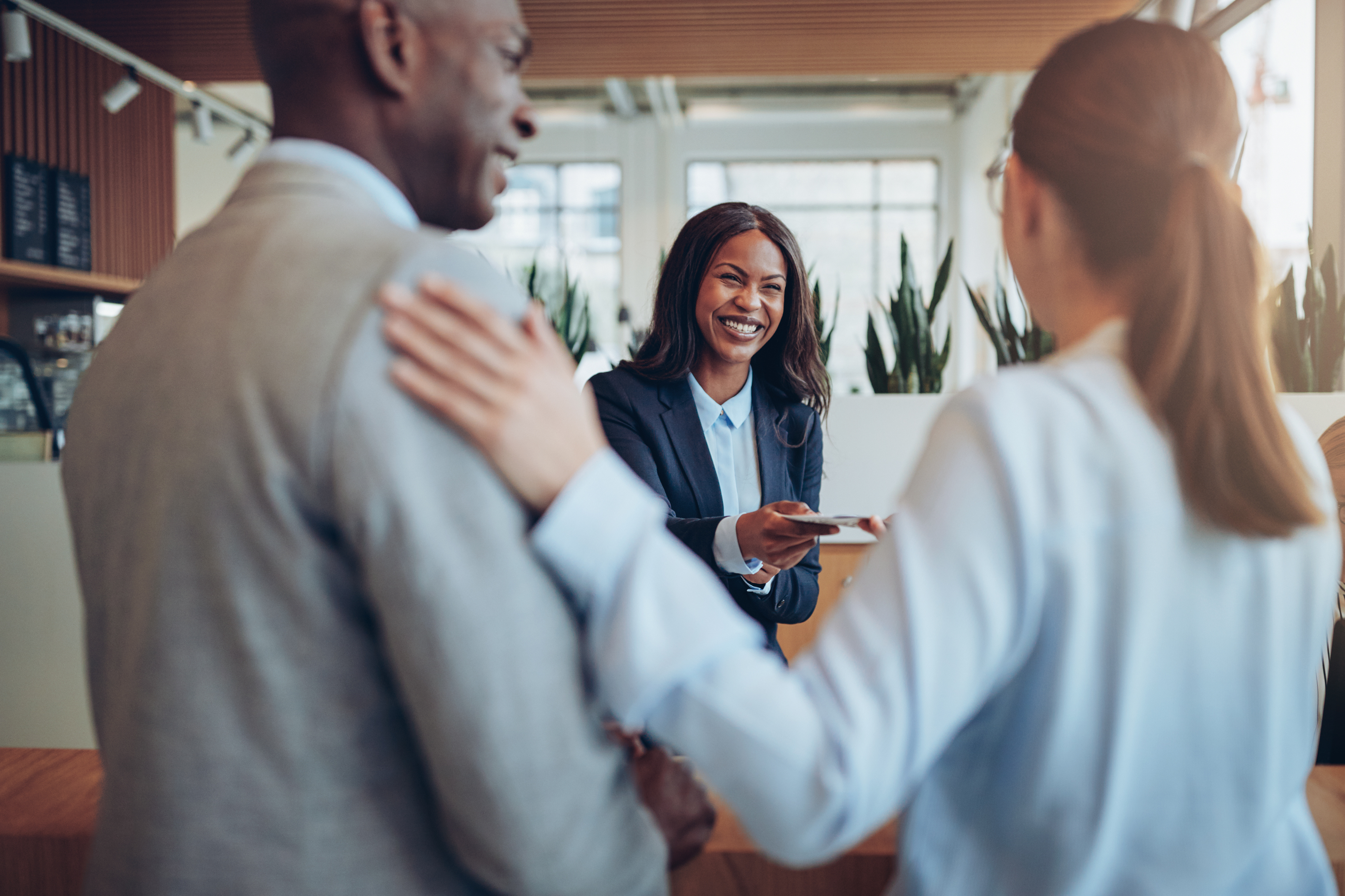Broker reviewing ACA Marketplace alternatives with a small-business owner and independent worker
